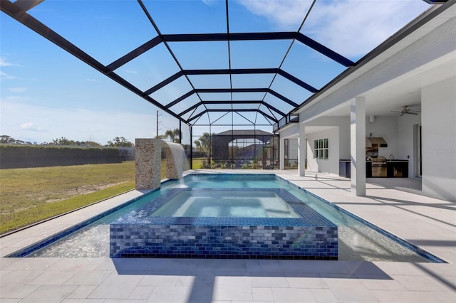 view of pool with area for grilling, a lanai, a ceiling fan, and a patio area