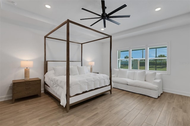 bedroom with a ceiling fan, light wood-style flooring, recessed lighting, and baseboards