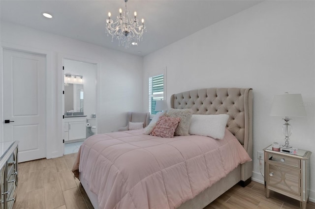 bedroom featuring recessed lighting, connected bathroom, light wood-style floors, and an inviting chandelier