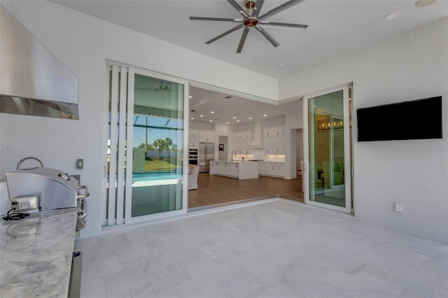 view of patio / terrace with a ceiling fan