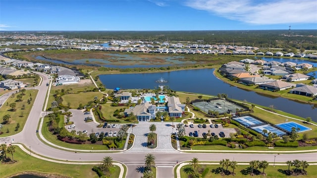 aerial view featuring a residential view and a water view