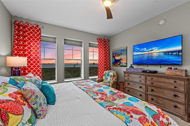 carpeted bedroom featuring a ceiling fan