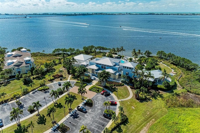 bird's eye view featuring a water view and a residential view