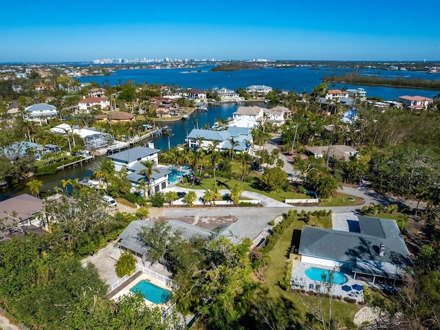 aerial view featuring a residential view and a water view