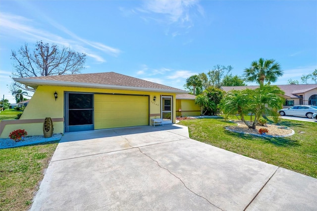 ranch-style home featuring a garage, stucco siding, concrete driveway, and a front lawn