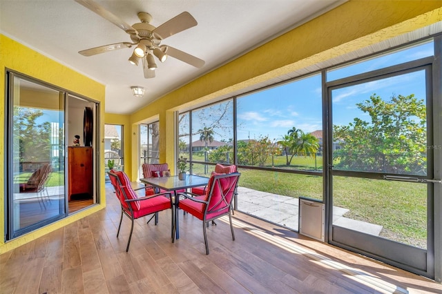 sunroom / solarium with ceiling fan