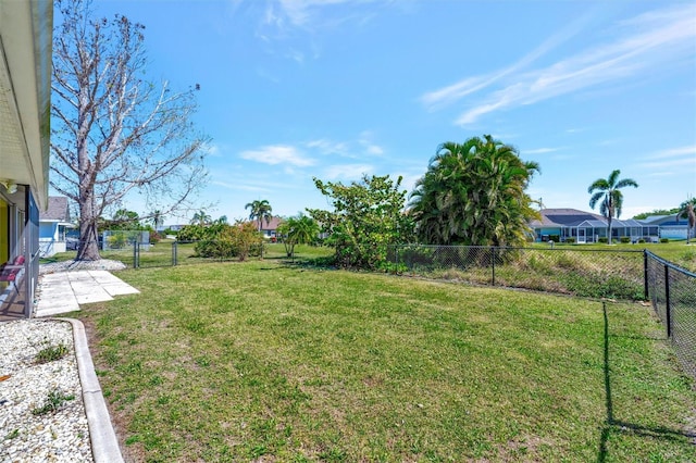 view of yard with a fenced backyard