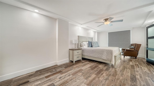 bedroom with ceiling fan, baseboards, wood finished floors, and recessed lighting