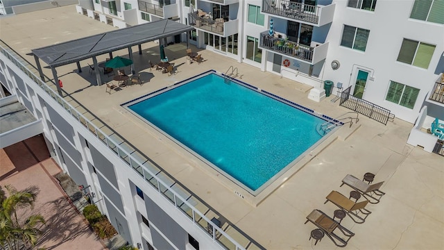 community pool featuring a patio