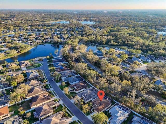 aerial view featuring a water view and a residential view