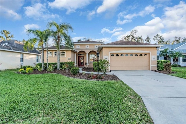 view of front of property featuring stucco siding, a front lawn, concrete driveway, and a garage