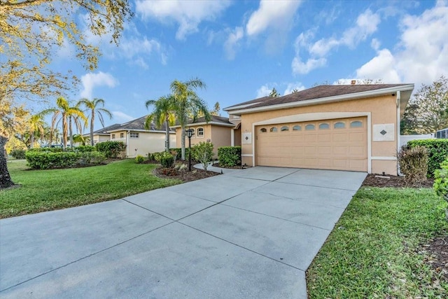 ranch-style house with stucco siding, a front lawn, concrete driveway, and a garage