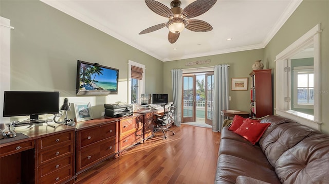 office with light wood finished floors, ceiling fan, and ornamental molding