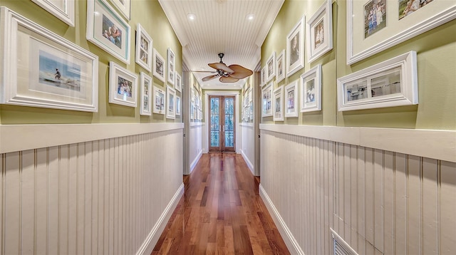 corridor with recessed lighting, french doors, crown molding, and wood finished floors