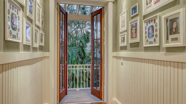 entryway with wood finished floors