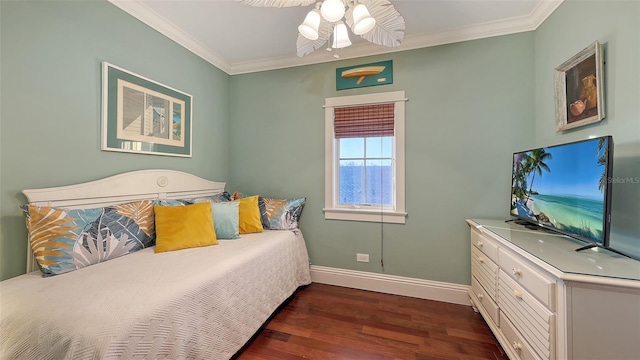 bedroom featuring ceiling fan, baseboards, dark wood-style flooring, and ornamental molding