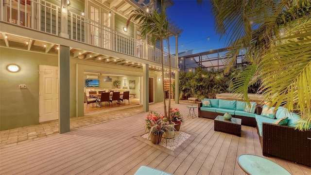 wooden deck with outdoor lounge area and outdoor dining space