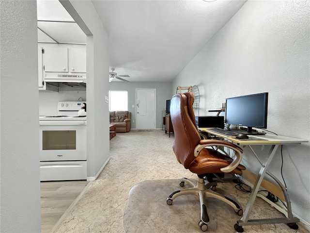 office with baseboards and a ceiling fan