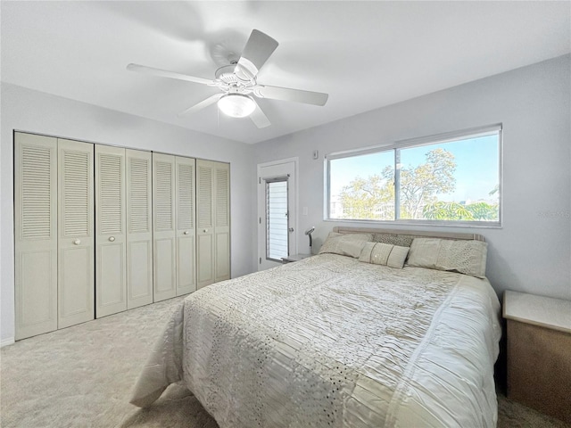 bedroom featuring a closet, a ceiling fan, and carpet flooring