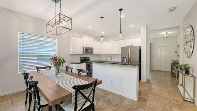 dining space featuring visible vents, a notable chandelier, recessed lighting, light tile patterned floors, and baseboards