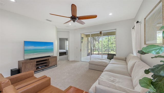 living room with recessed lighting, visible vents, light colored carpet, and ceiling fan