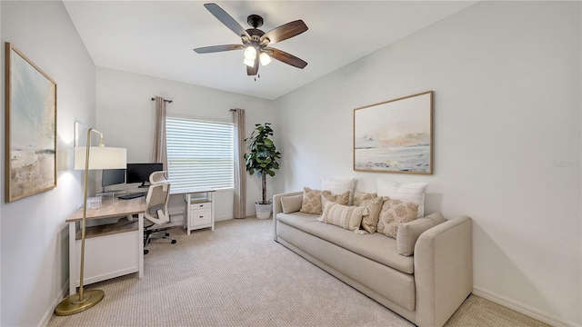 office space with baseboards, carpet floors, and ceiling fan