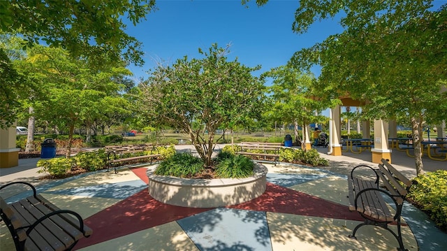 surrounding community with a patio