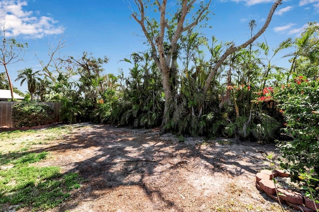 view of yard with fence