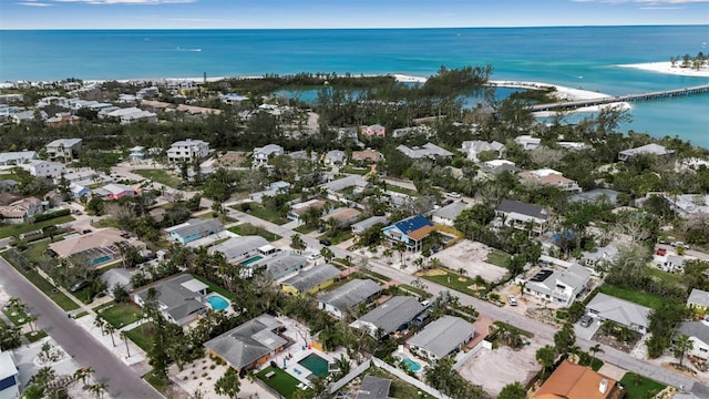 aerial view featuring a residential view and a water view