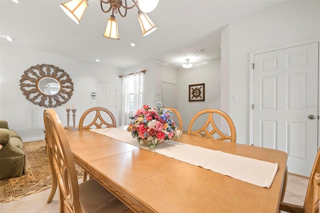 dining area with light tile patterned floors