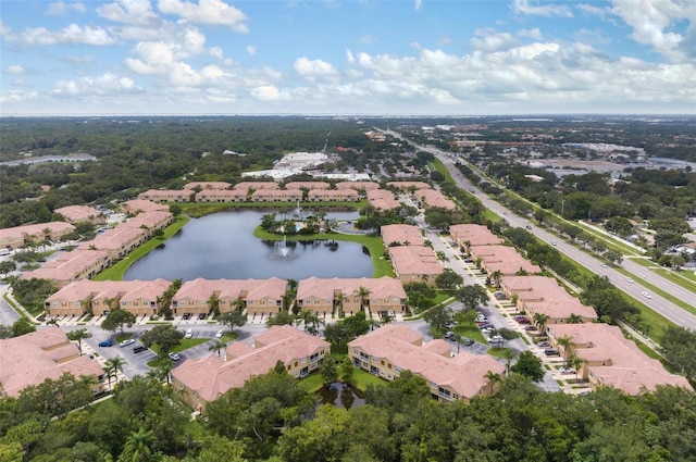 aerial view featuring a residential view and a water view