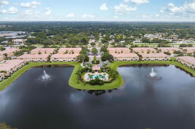 bird's eye view featuring a water view and a residential view