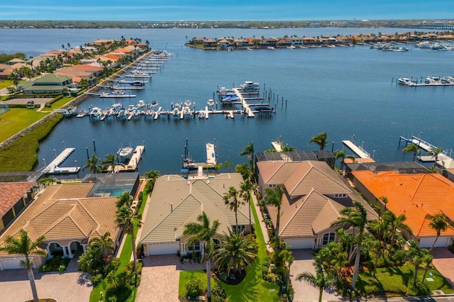 aerial view with a water view and a residential view