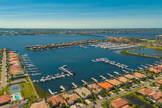 birds eye view of property featuring a water view