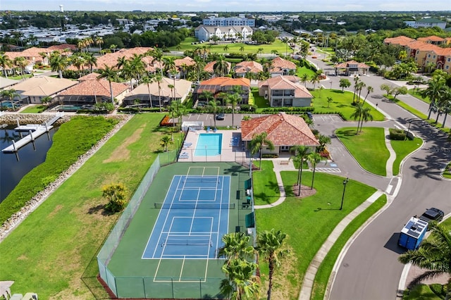 1009 3rd St E, Palmetto, FL 34221 - aerial view of residential area featuring a large body of water and a pool