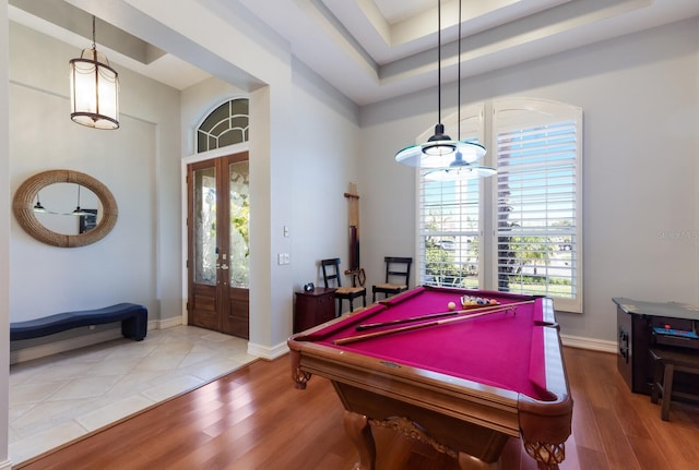 1009 3rd St E, Palmetto, FL 34221 - playroom featuring french doors, wood finished floors, billiards, and a raised ceiling