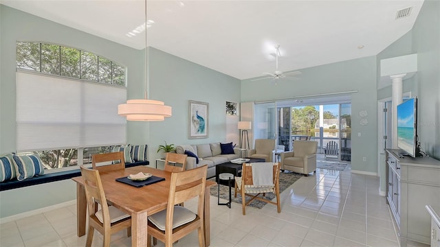 dining area with light tile patterned flooring, visible vents, baseboards, and ceiling fan