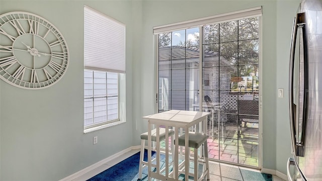 dining space with baseboards