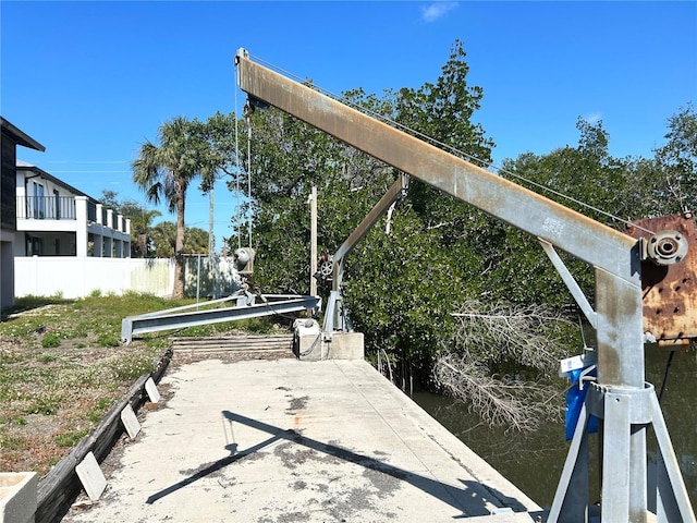 view of community with fence