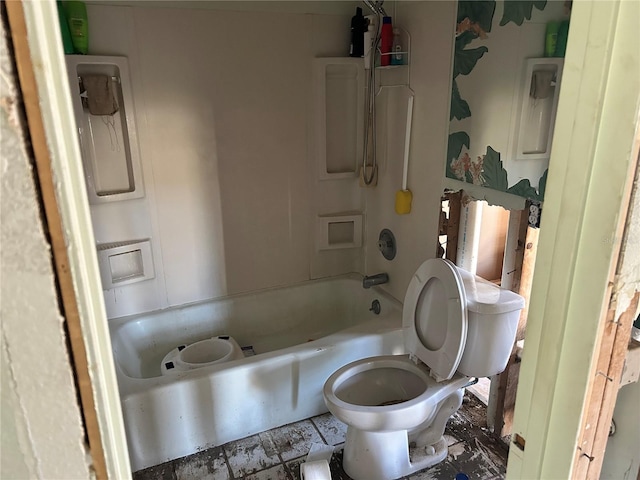 bathroom with toilet and shower / bathtub combination