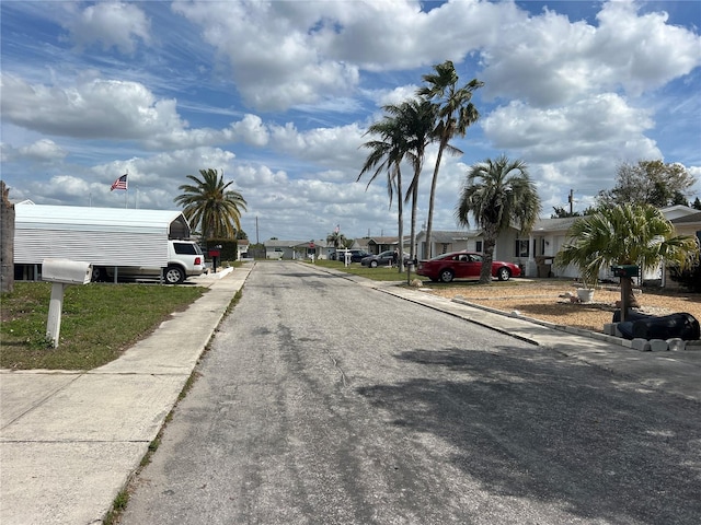 3525 Emory Dr, Holiday, FL 34691 - view of street with curbs and a residential view