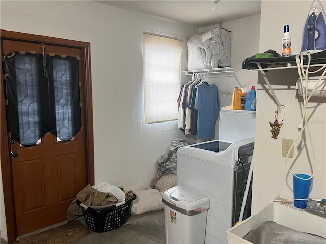 3525 Emory Dr, Holiday, FL 34691 - washroom featuring laundry area, washer / clothes dryer, concrete block wall, and a sink