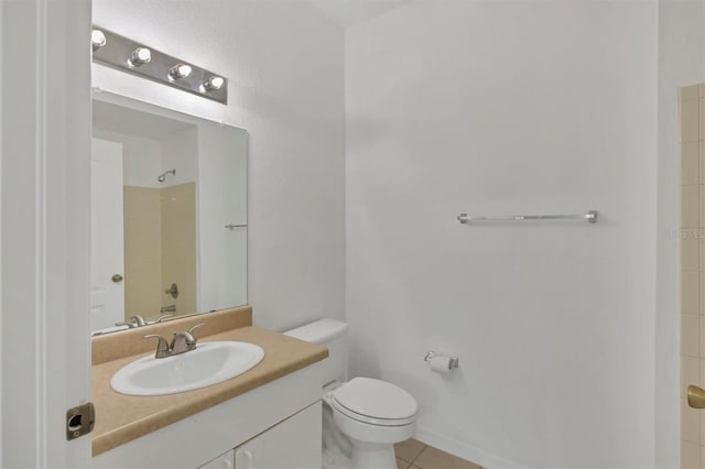 full bath with toilet, walk in shower, vanity, and tile patterned flooring