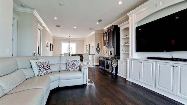 living room with dark wood-type flooring, crown molding, visible vents, and a chandelier