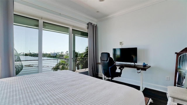 bedroom featuring wood finished floors, baseboards, ornamental molding, and access to outside