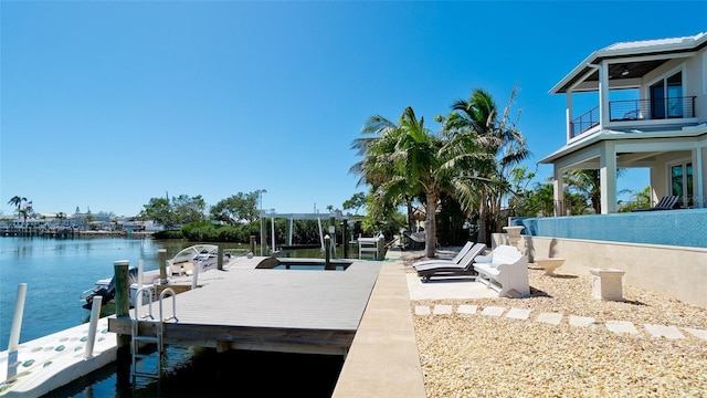 view of dock with a water view