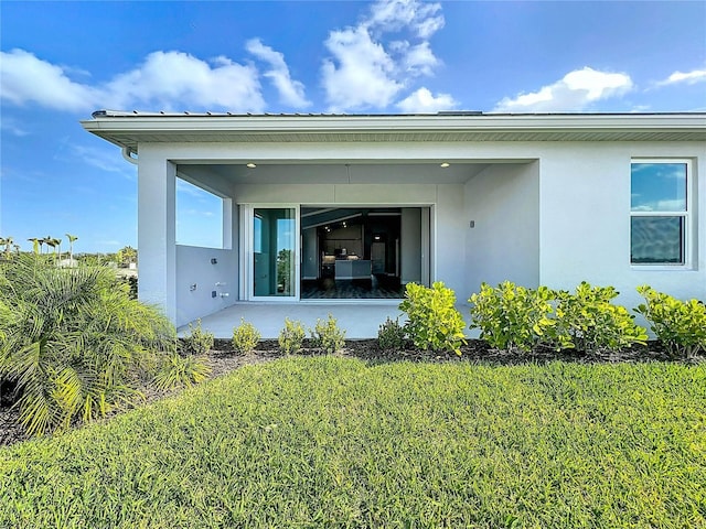 exterior space featuring stucco siding