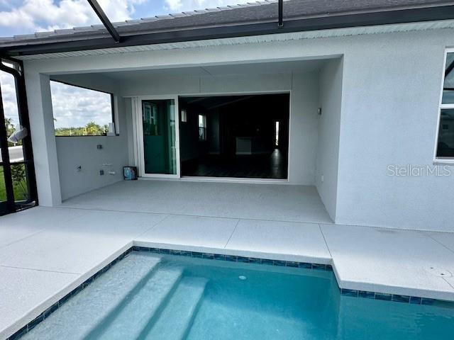 10006 Degas Ter, Bradenton, FL 34212 - view of swimming pool featuring a patio area and a lanai