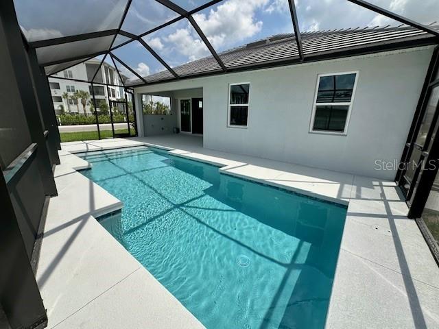 10006 Degas Ter, Bradenton, FL 34212 - swimming pool with a patio and a lanai