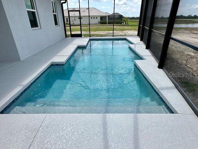 10006 Degas Ter, Bradenton, FL 34212 - outdoor pool with a lanai and a patio